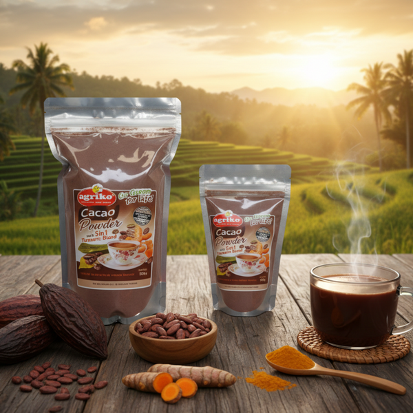 Two packages of Agrifina Cacao Powder on a wooden table with cacao beans, a cup of hot chocolate, and a scenic background.