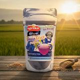 Agriko Blue Terna Tea Powder packaging with a scenic background