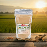 Package of Salabat ginger tea on a wooden surface with a scenic background
